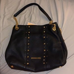 Michael Kors purse new never used.
